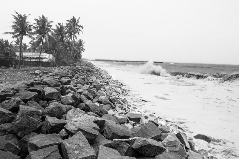 Living Below the Sea Level - Arabian Sea and a human habitation on the coast in Kuttanad, Alappuzha district, Kerala